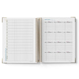 Open spiral-bound 2027 ECEC Programming Diary with schedule and birthday pages on a white background
