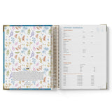 Open spiral-bound 2027 ECEC Programming Diary with floral design on one page and text on the other, on a white background.